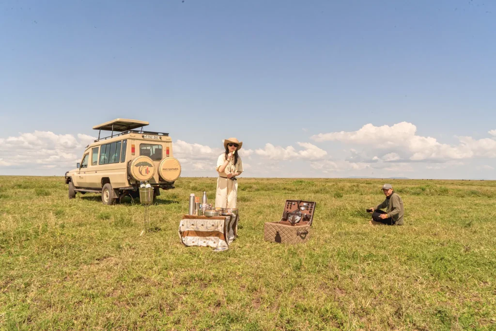 Visitor taking a lunch break while on a Budget Tanzania safari in Tanzania's Serengeti National Park